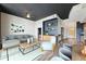 Open concept living space boasting a modern design, wood floors, and decorative accents at 3400 Malone Dr # 303, Atlanta, GA 30341