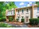 Traditional multi-level home with manicured front lawn and beige siding at 4108 Gray Birch Ln, Duluth, GA 30096