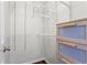 Walk-in closet features built-in shelving and storage for organization at 4108 Gray Birch Ln, Duluth, GA 30096