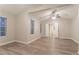Spacious bedroom featuring vaulted ceilings, wood-look floors, and an ensuite bathroom at 7113 Ambercrest Ct, Austell, GA 30168