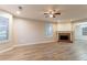 Inviting living room with recessed lighting, fireplace, and a large window offering plenty of natural light at 7113 Ambercrest Ct, Austell, GA 30168