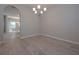 Inviting dining room with wood floors and an archway leading to other rooms at 16 Deer Place, Villa Rica, GA 30180