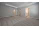 Spacious main bedroom boasts a trey ceiling and access to both a full bath and a large walk-in closet at 16 Deer Place, Villa Rica, GA 30180