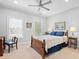 Bedroom with two windows, a ceiling fan, and carpet at 1974 Mason Mill Rd, Decatur, GA 30033