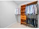 Custom closet with built-in shelving and hanging space at 1974 Mason Mill Rd, Decatur, GA 30033