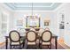 Refined dining room with a large table set for dinner, stylish lighting, and ample seating at 1974 Mason Mill Rd, Decatur, GA 30033