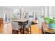 The kitchen features a table with barstool seating that transitions to the living space with an open floor plan at 1974 Mason Mill Rd, Decatur, GA 30033