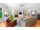 Spacious living room with hardwood floors, fireplace, and a view of the staircase at 1974 Mason Mill Rd, Decatur, GA 30033