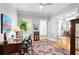 Bright office with hardwood floors, desk, and ample natural light, perfect for productivity at 1974 Mason Mill Rd, Decatur, GA 30033