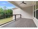 Outdoor patio with a view of the surrounding greenery at 6830 Heard Ln, Cumming, GA 30041
