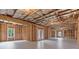 Unfinished basement with exposed ceiling and ample space at 6830 Heard Ln, Cumming, GA 30041