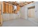 Unfinished basement with exposed ceiling and ample space at 6830 Heard Ln, Cumming, GA 30041