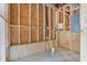 Unfinished basement with exposed ceiling and ample space at 6830 Heard Ln, Cumming, GA 30041