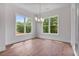 Dining area with windows and natural light, perfect for Gathering meals at 6830 Heard Ln, Cumming, GA 30041