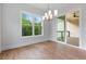 Bright dining area with a view and sliding doors to the outdoor space at 6830 Heard Ln, Cumming, GA 30041