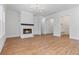 Open living area with a fireplace, ideal for entertaining guests at 6830 Heard Ln, Cumming, GA 30041