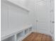 Well-organized mudroom with built-in bench and storage at 6830 Heard Ln, Cumming, GA 30041