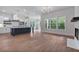 Open floorplan showcasing the spacious kitchen with an island and large windows at 6830 Heard Ln, Cumming, GA 30041