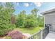 Beautiful backyard features manicured lawn, lush landscaping, and a charming patio, creating a serene outdoor space at , Cumming, GA 30041