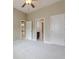Bright bedroom featuring neutral walls, plush carpet, and a ceiling fan for added comfort at , Cumming, GA 30041