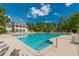 Large community pool with a view of the clubhouse and plenty of lounge chairs for relaxation at , Cumming, GA 30041