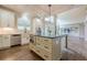 Open kitchen with island features stainless appliances, ample counter space, and seamless flow to the living area at , Cumming, GA 30041