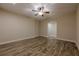 Cozy living room showcasing hardwood floors, neutral walls, and a ceiling fan for added comfort at , Cumming, GA 30041