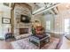 Cozy lounge area with a stone fireplace, comfortable seating, and elegant decor at , Cumming, GA 30041