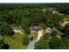 Secluded property is surrounded by dense trees, providing exceptional privacy and a serene setting at 35 Brooke Holw, Covington, GA 30016