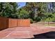 A large wooden deck offers plenty of space for outdoor entertaining and relaxing at 35 Brooke Holw, Covington, GA 30016