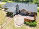 An aerial view of a backyard with a wooden deck, a stone border, and a fenced yard at 35 Brooke Holw, Covington, GA 30016