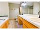 Bathroom with double vanity sinks and a soaking tub at 35 Brooke Holw, Covington, GA 30016
