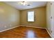 Bedroom featuring neutral walls and hardwood floors at 35 Brooke Holw, Covington, GA 30016