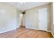 Spacious bedroom with hardwood floors, with entry doors and a closet at 35 Brooke Holw, Covington, GA 30016