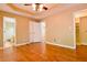 Main bedroom showing tray ceiling, and ensuite bath, and walk in closet at 35 Brooke Holw, Covington, GA 30016