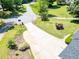 A home with a long driveway and a well-manicured front lawn at 35 Brooke Holw, Covington, GA 30016