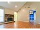 This living room is a great space featuring a stone fireplace and plenty of room for seating at 35 Brooke Holw, Covington, GA 30016