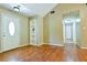Bright living room with doorway and hardwood floors at 35 Brooke Holw, Covington, GA 30016