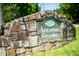 The stone Autumn Brooke community sign shows the pride of ownership in the neighborhood at 35 Brooke Holw, Covington, GA 30016