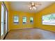 Bright sun room featuring large windows and tile flooring at 35 Brooke Holw, Covington, GA 30016