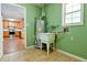 View from the utility room to the kitchen, showing water heater and sink at 35 Brooke Holw, Covington, GA 30016