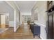 Inviting foyer with hardwood floors, elegant molding, and a view into the living spaces at 905 Brooksglen Dr, Roswell, GA 30075