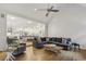 Spacious open concept living room with hardwood floors and seamless access to kitchen at 905 Brooksglen Dr, Roswell, GA 30075