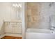 Bathroom with shower-tub combo and a large vanity at 973 Peachtree Battle Ave, Atlanta, GA 30327