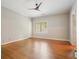 Large bedroom with hardwood floors, neutral paint, and natural light at 973 Peachtree Battle Ave, Atlanta, GA 30327