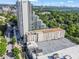 High angle view of the property, surrounded by lush greenery and overlooking the distant city at 1421 Peachtree Ne St # 304, Atlanta, GA 30309
