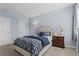 Inviting bedroom with a comfortable bed, bedside table, and ample natural light through a window at 1421 Peachtree Ne St # 304, Atlanta, GA 30309