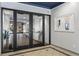 Modern lobby entrance with secure access and stylish black-framed glass doors at 1421 Peachtree Ne St # 304, Atlanta, GA 30309