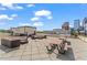 Expansive rooftop deck offering city views and comfortable lounging and dining areas at 1421 Peachtree Ne St # 304, Atlanta, GA 30309