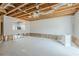 Unfinished basement with exposed ceiling, ready for a custom design and renovation at 2255 Bigwood Trl, Atlanta, GA 30349